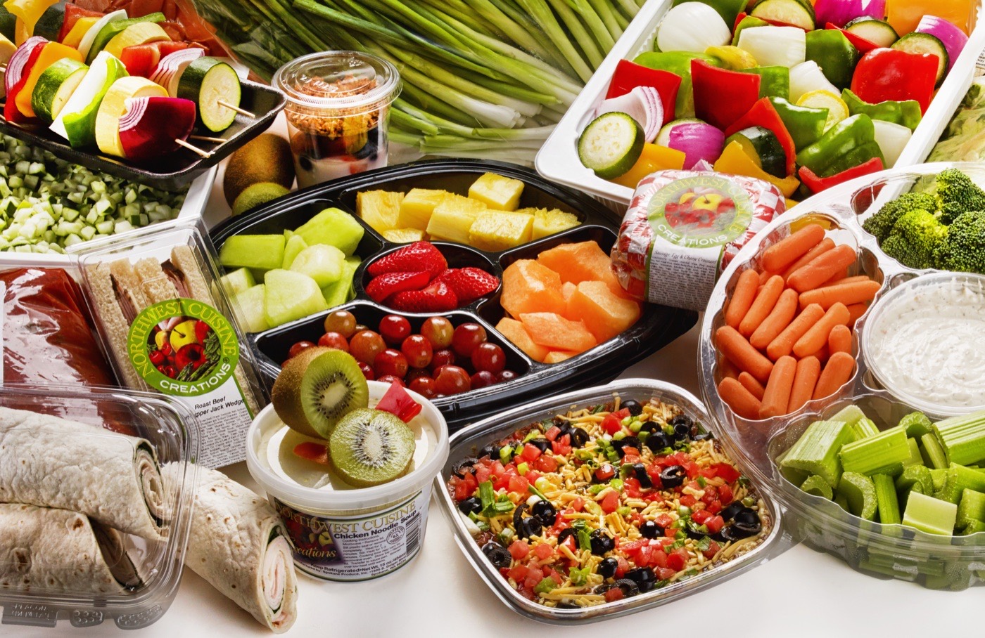 Assorted cut-fruit and snack trays